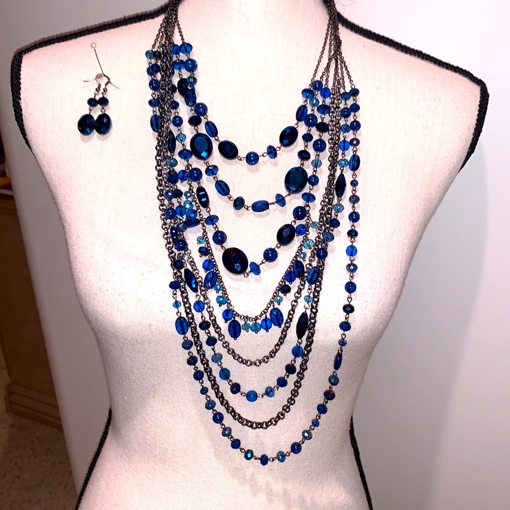 Multi strand blue beaded necklace with matching earrings